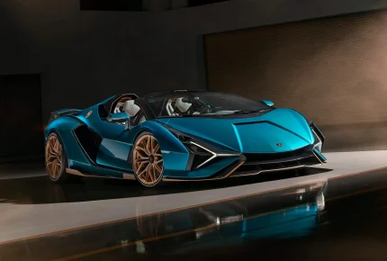 Передній ракурс 3/4 Lamborghini Sián Roadster у фірмовому кольорі Blu Uranus, що демонструє дизайн переднього сплітера.