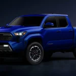 Вигляд з переду в темно синіх кольорах Toyota Tacoma 2024